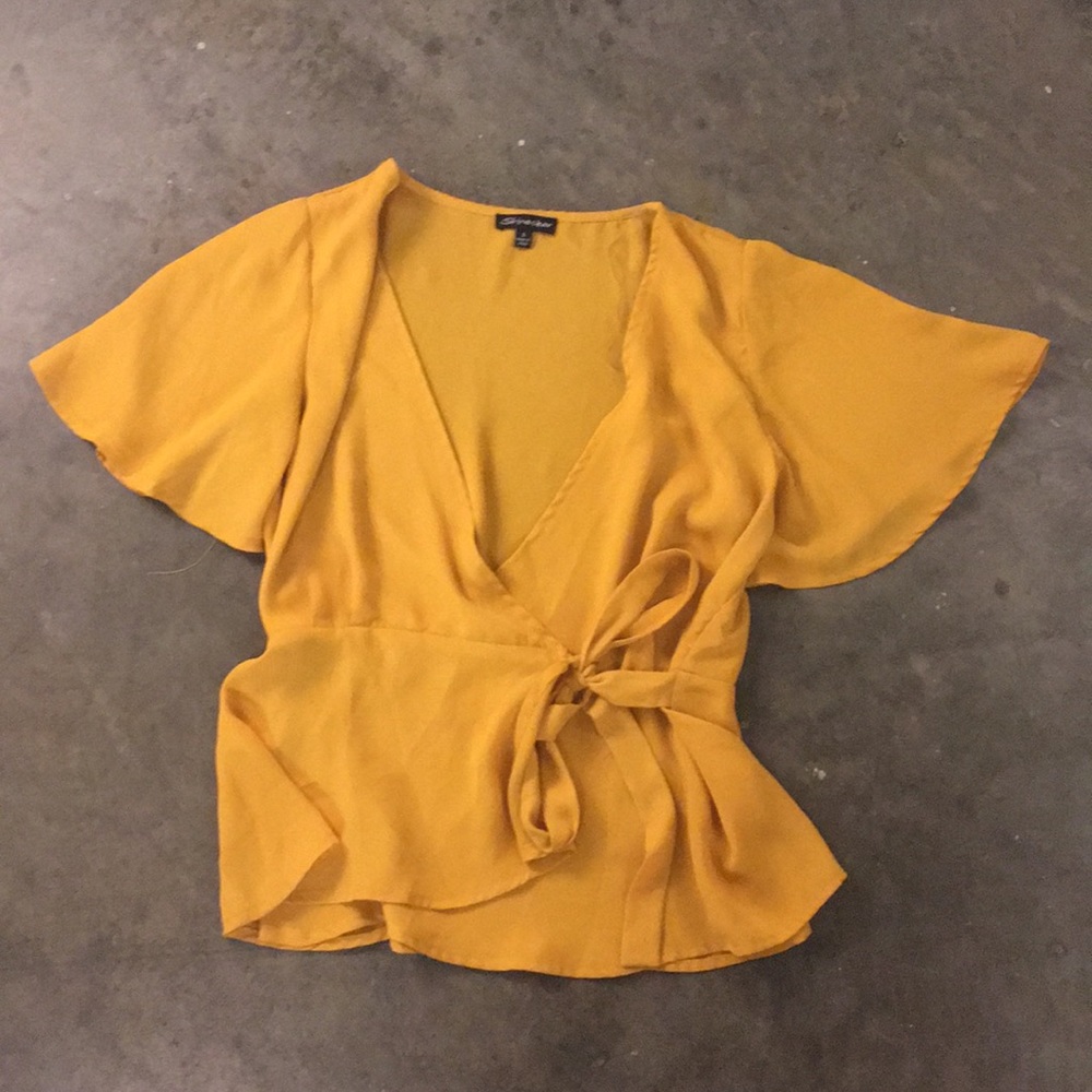 Golden yellow wrap v-neck peplum top